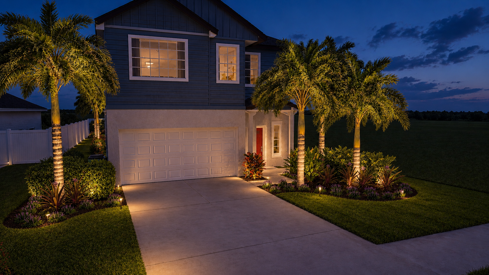 Professionally lit Florida residence with layered architectural and landscape lighting